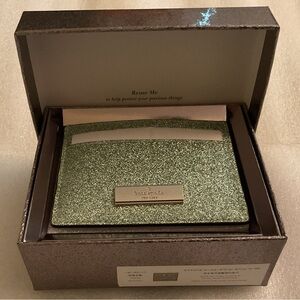 NIB Kate Spade New York Kenzie Glitter CH In The Discontinued “Seawater” Finish.